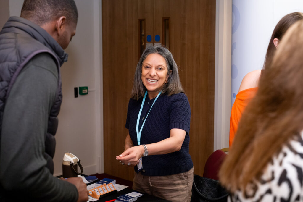 Socitm president, Yogita Popat, helping on the reception desk at President's Conference 2026