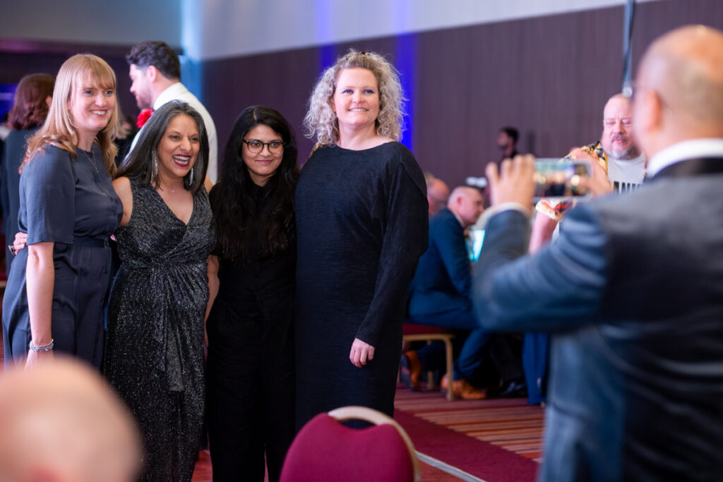 Yogita Popat pausing for a photograph with attendees at President's Conference 2026